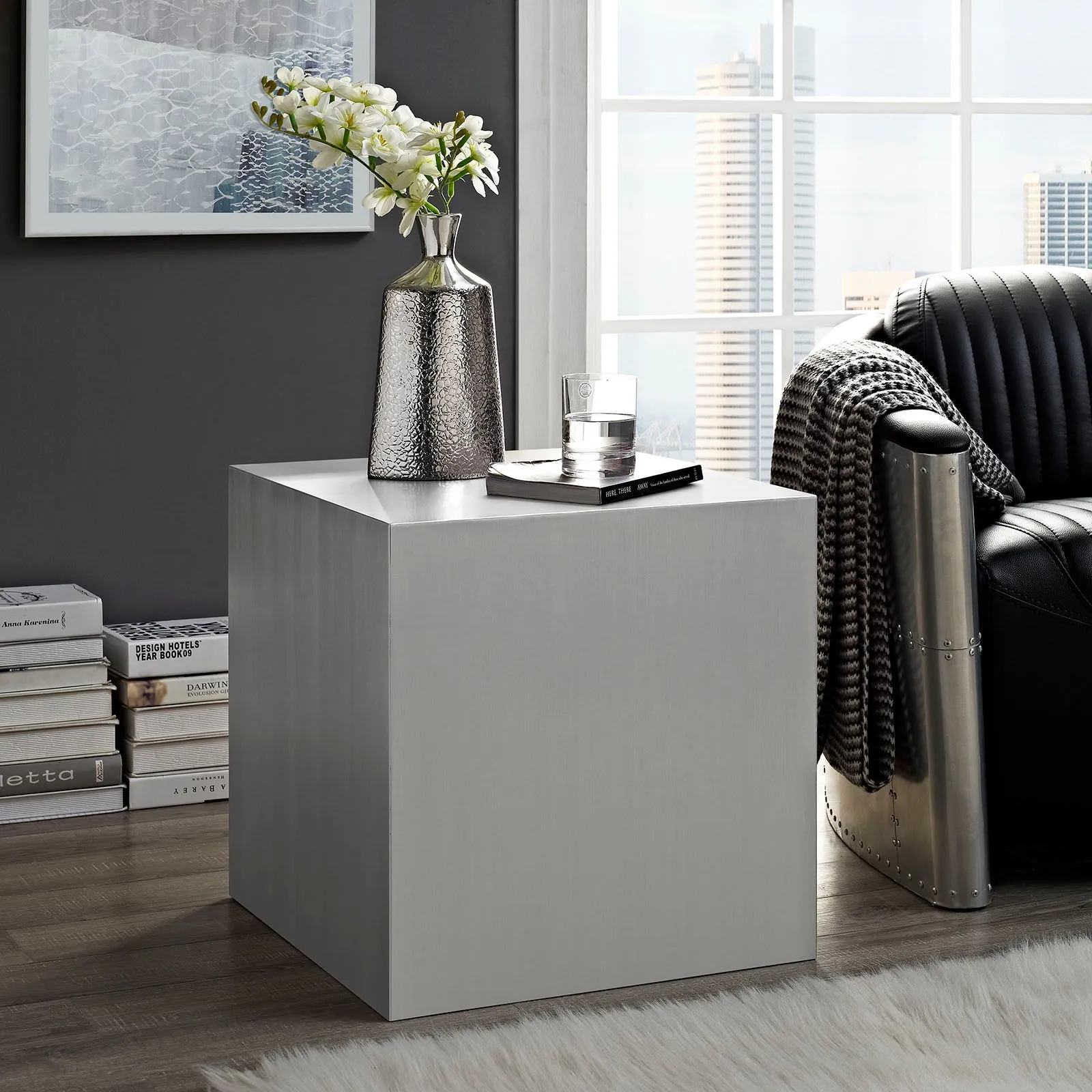 CAST STAINLESS STEEL SIDE TABLE